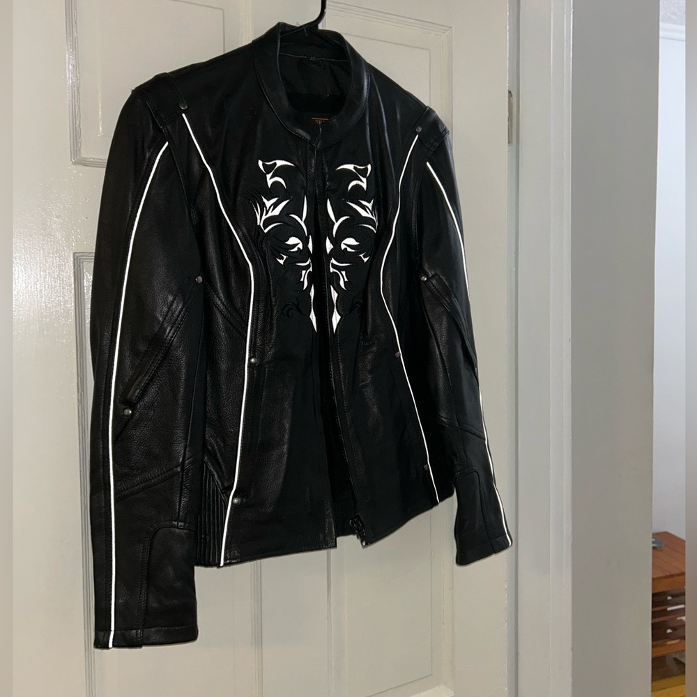 Stylish Black Leather Jacket with White Detailing
